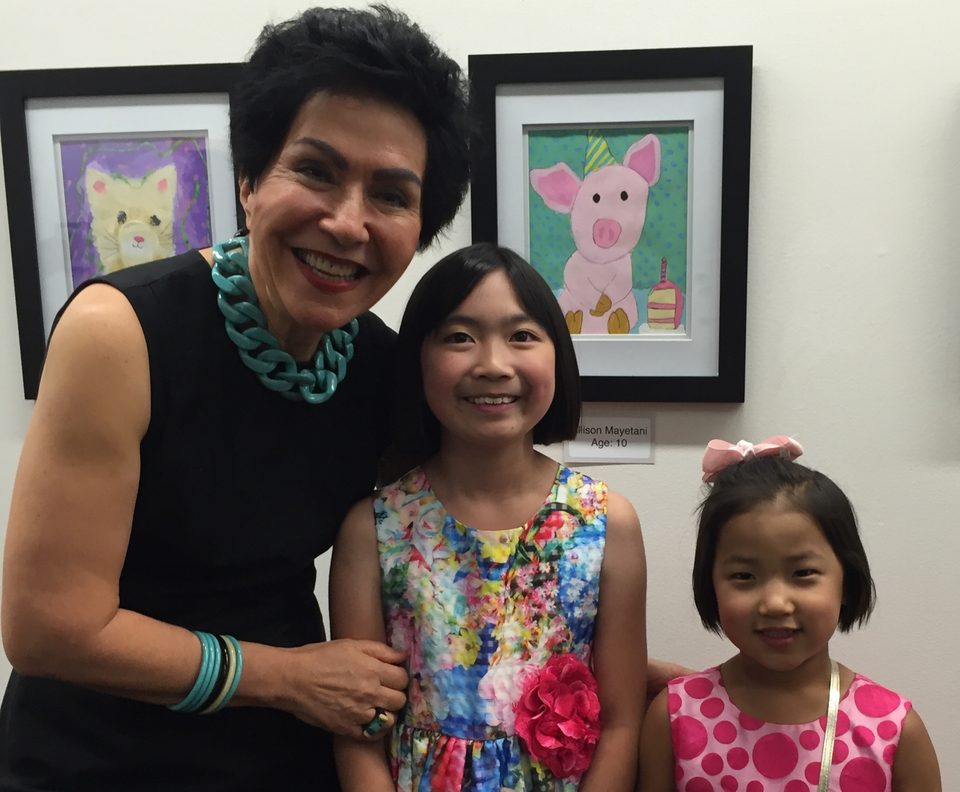Fahimeh with her students at the Salt Lake City library, where she exhibits their artwork each year